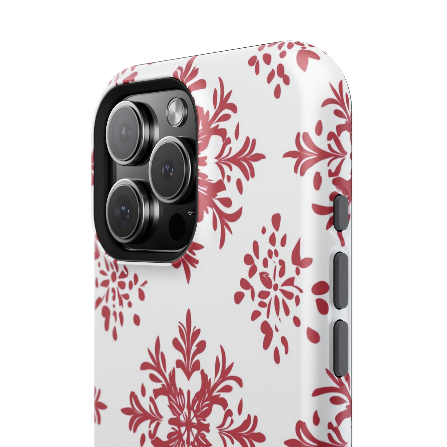 A phone case with a white background and a red floral pattern. The case has a camera module with three lenses visible on the back.